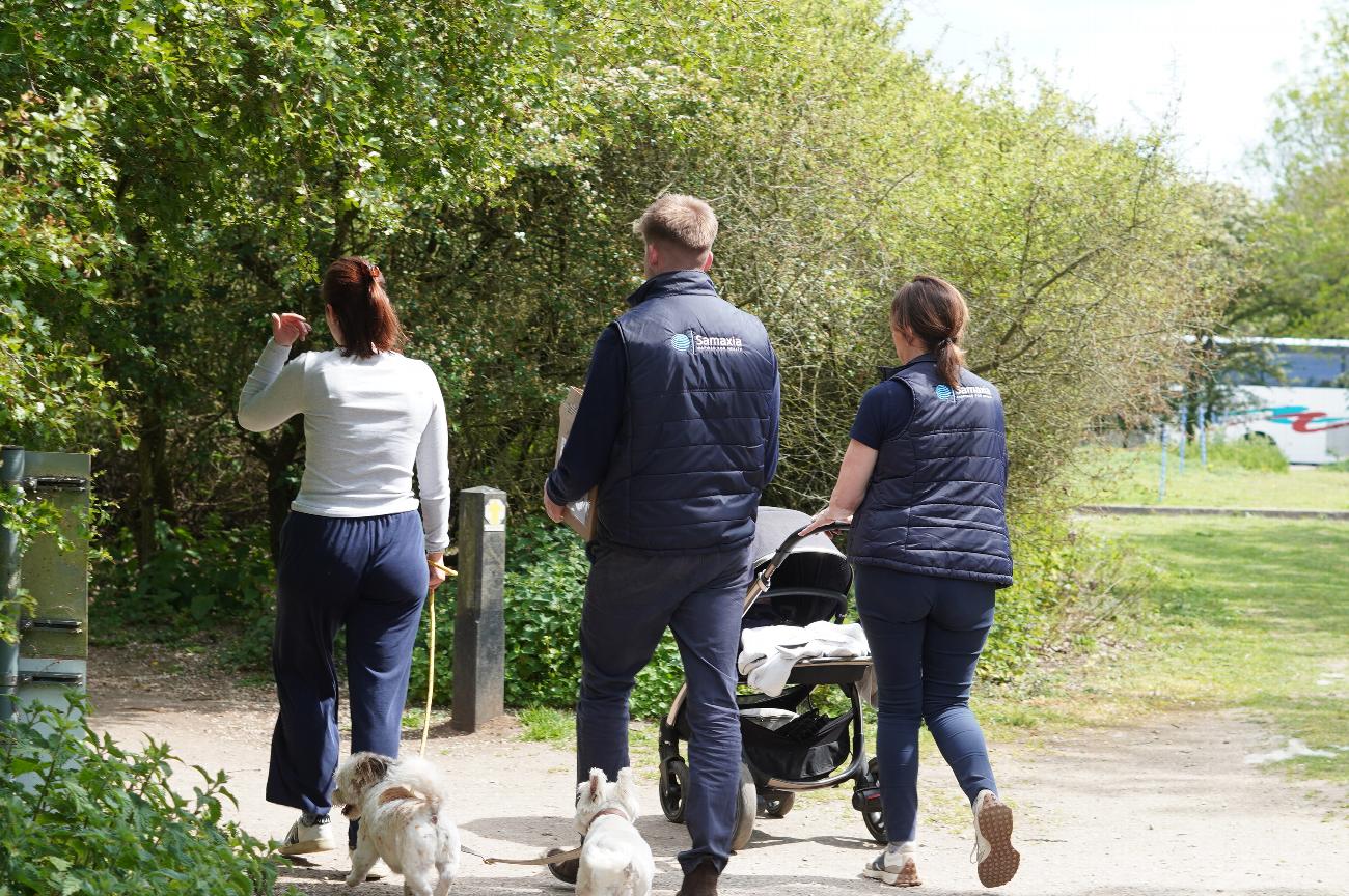 The Samaxia family enjoying a walk with their dogs
